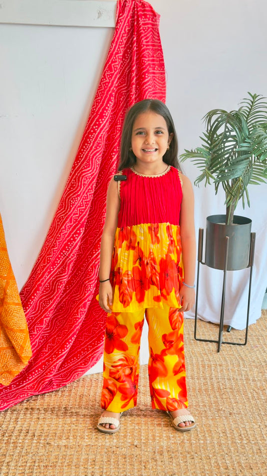 Red & Yellow Floral Plazo Set - girl wearing red pleated top with yellow red floral plazo pants