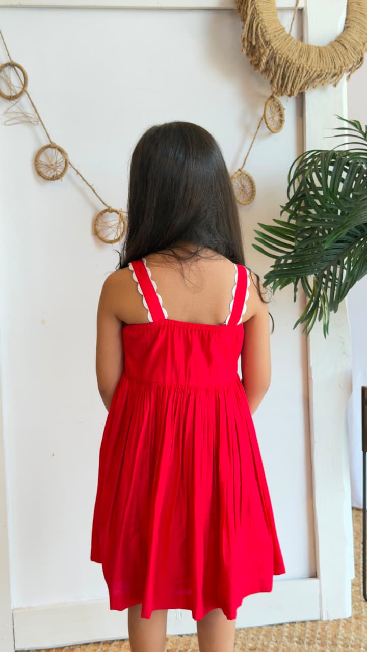 Back view of a red sleeveless fit-and-flare girls dress